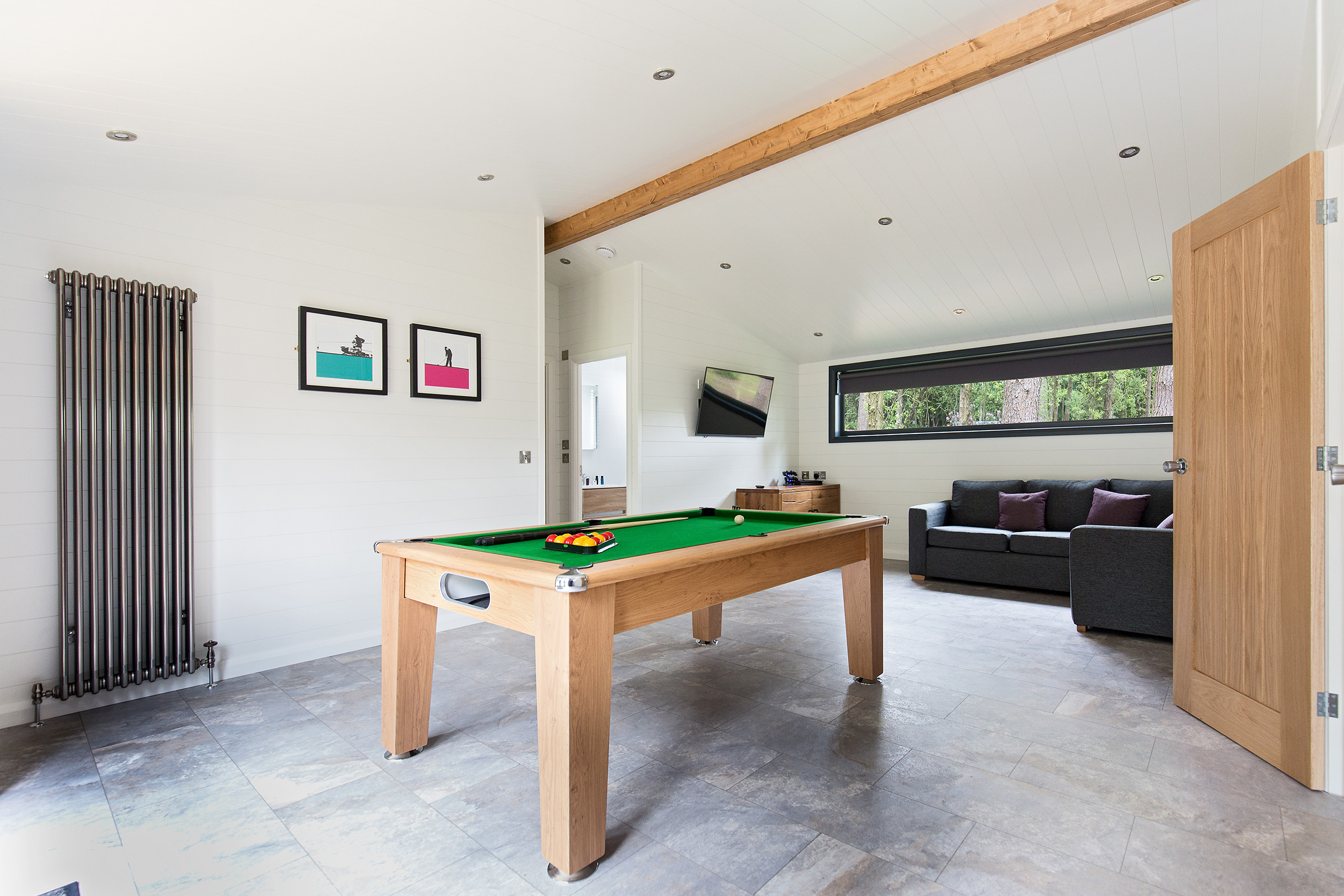 The Glade Timber Lodge — Games room with pool table