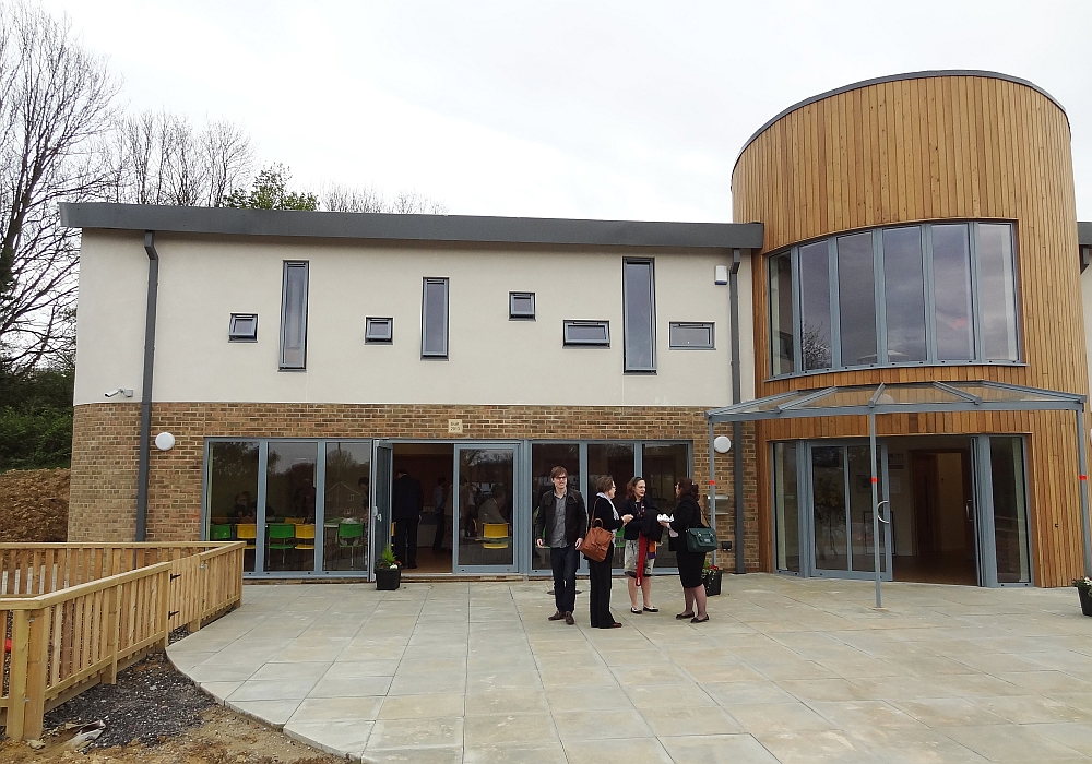 Community centre and church - exterior with people outside