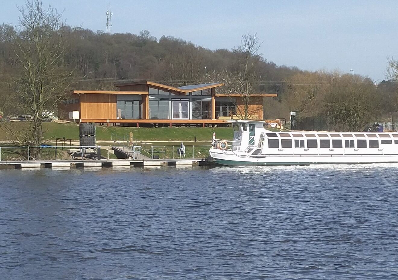 A view of the Princess River Cruises facilities building from accross the river