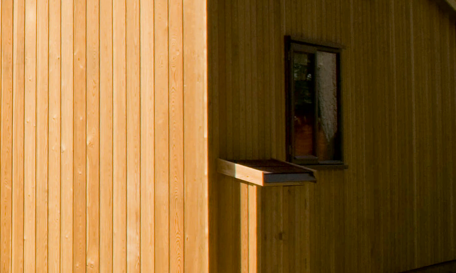 Vertical shiplap larch cladding