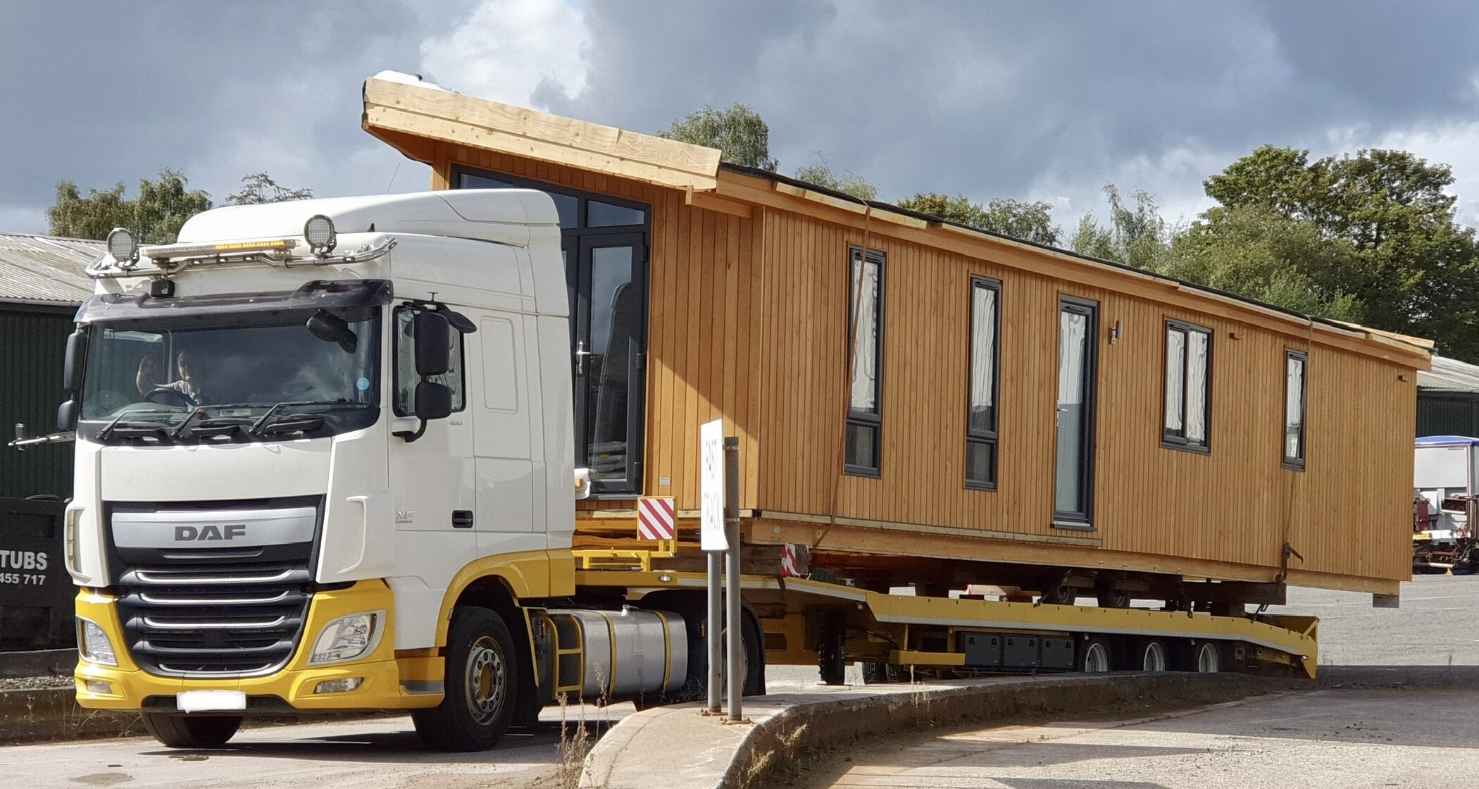 New Pinelog lodge on lorry for delivery to delivery park